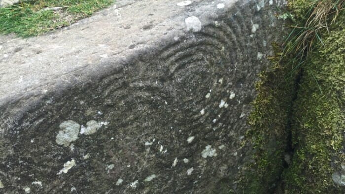 There are more stones with symbols in the area.