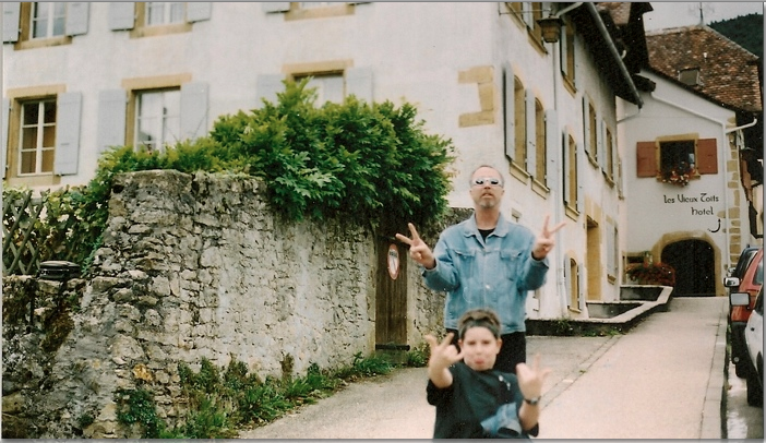 Image: Father and son posing for photo on trip of a lifetime