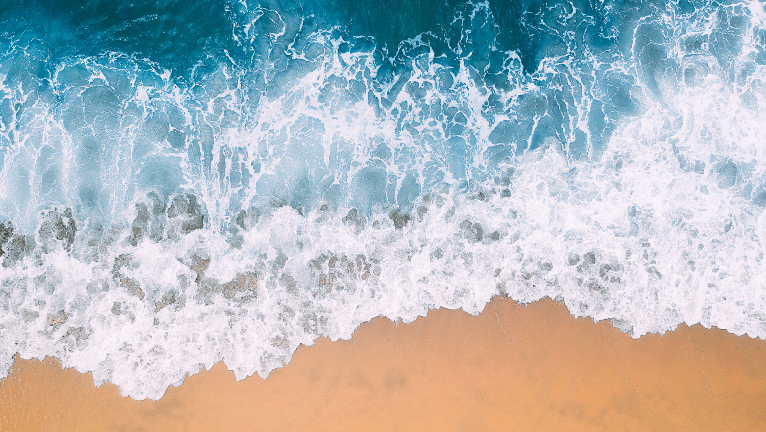 water and sand at a solo beach vacation destination